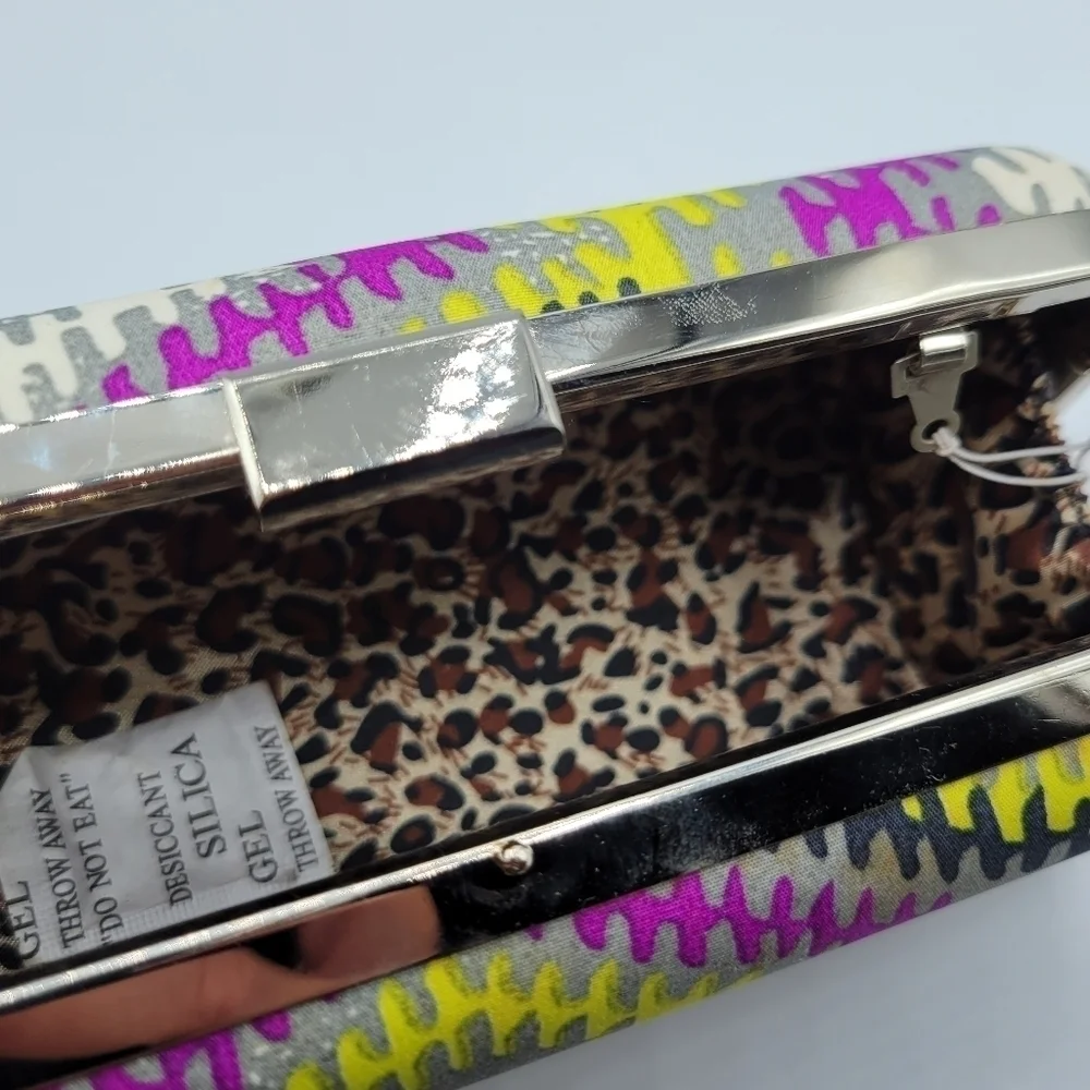 Charming Charlie yellow multicolor clutch Purse